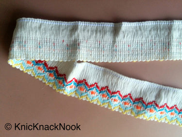 White / Black Threaded Trim With Red, Blue, Yellow And Orange Embroidery